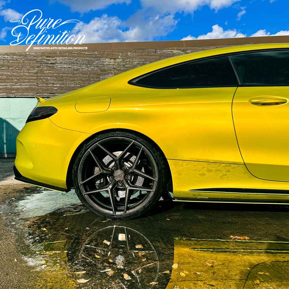 clean yellow c63 amg washed with gloss wash shampoo
