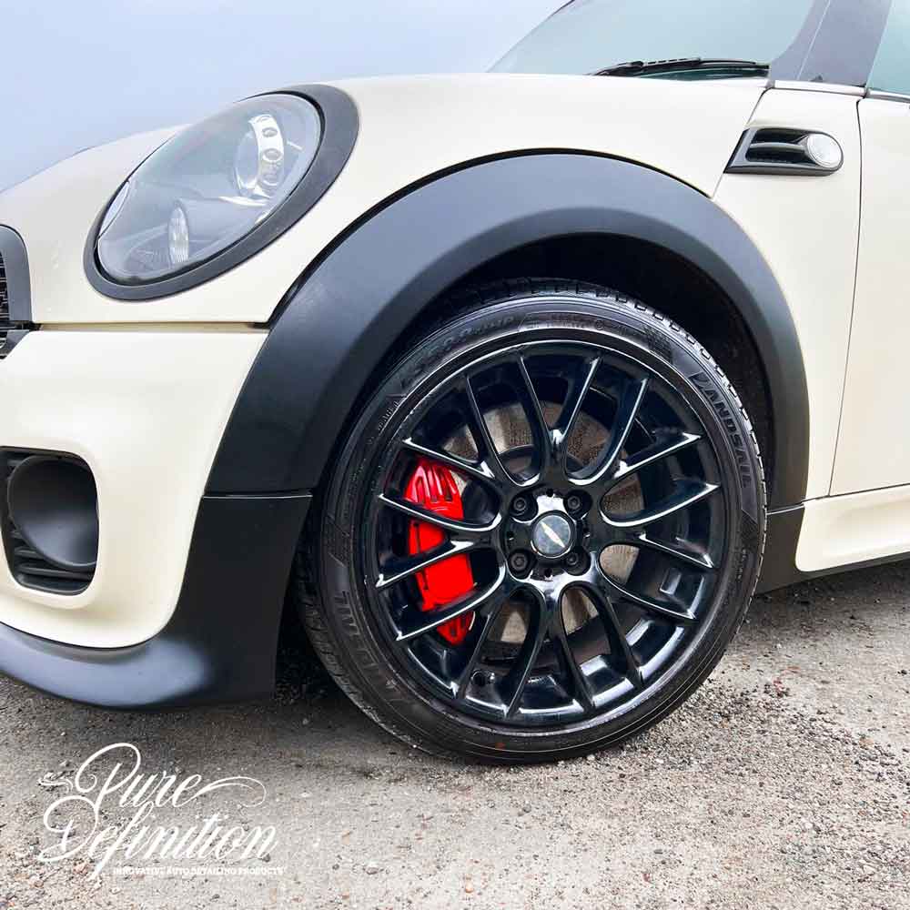tyres and trim restored to a radiant glossy black shine on a mini